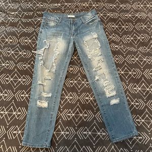 Very distressed light wash jeans